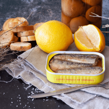 Image of an open tin of Ferrigno La Bonne Mer Sardines au Citron Confit (w/ Preserved Lemon and Green Olives)