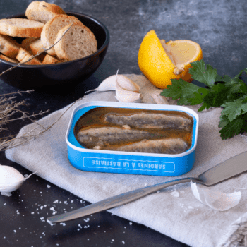 Image of an open tin of Ferrigno La Bonne Mer Sardines à la Bastiaise (w/ Lemon, Garlic and Parsley)