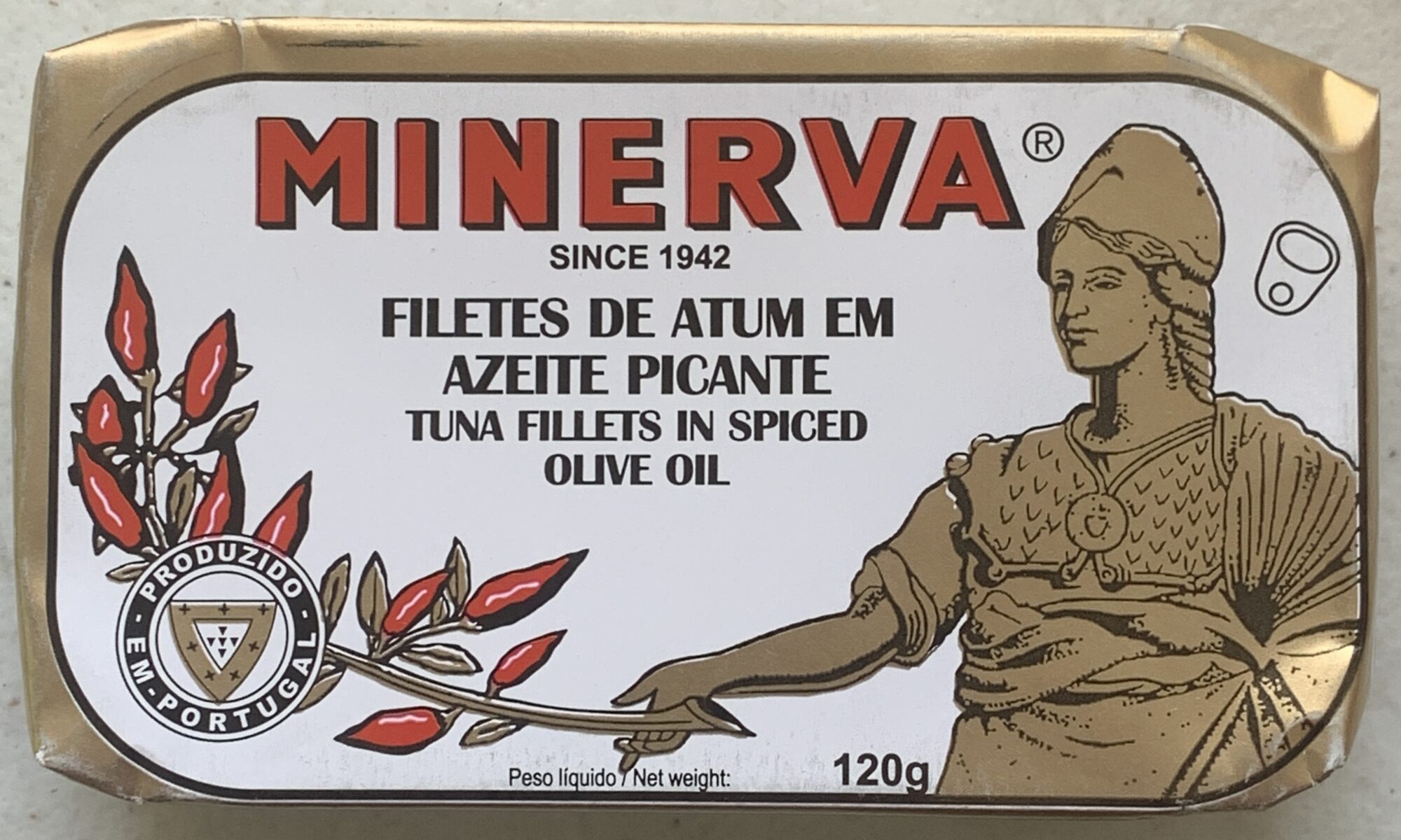 Image of the front of a package of Minerva Skipjack Tuna Fillets in Spiced Olive Oil