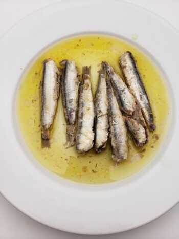 Image of Ferrigno anchovies in olive oil on plate