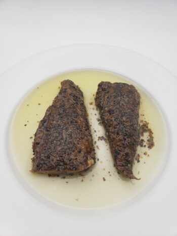 Image of the plated contents of a tin of Ocean's Smoked Peppered Mackerel