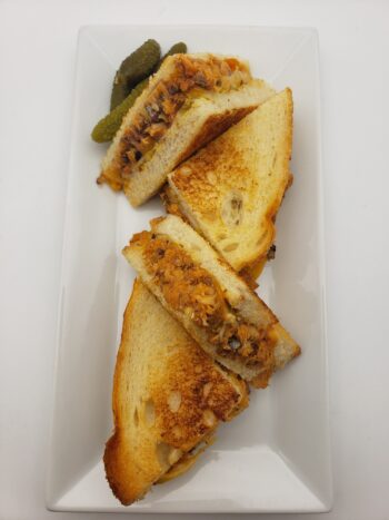 Image of Pinhais sardines in spiced tomato sauce in grilled cheese