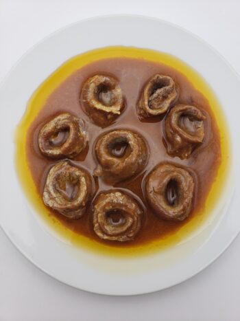 Image of Rizzoli anchovies in spicy sauce on plate
