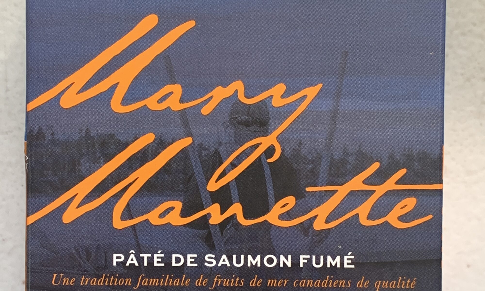 Image of the front of a package of Mary Manette Smoked Salmon Pâté