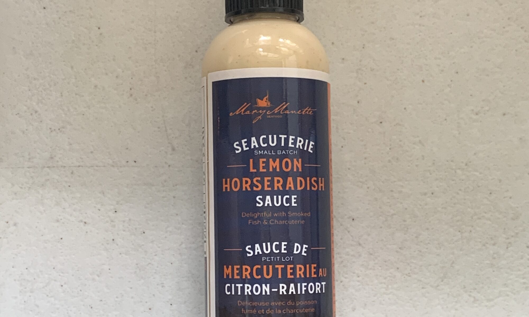 Image of the front of a bottle of Mary Manette Seacuterie Lemon Horseradish Sauce