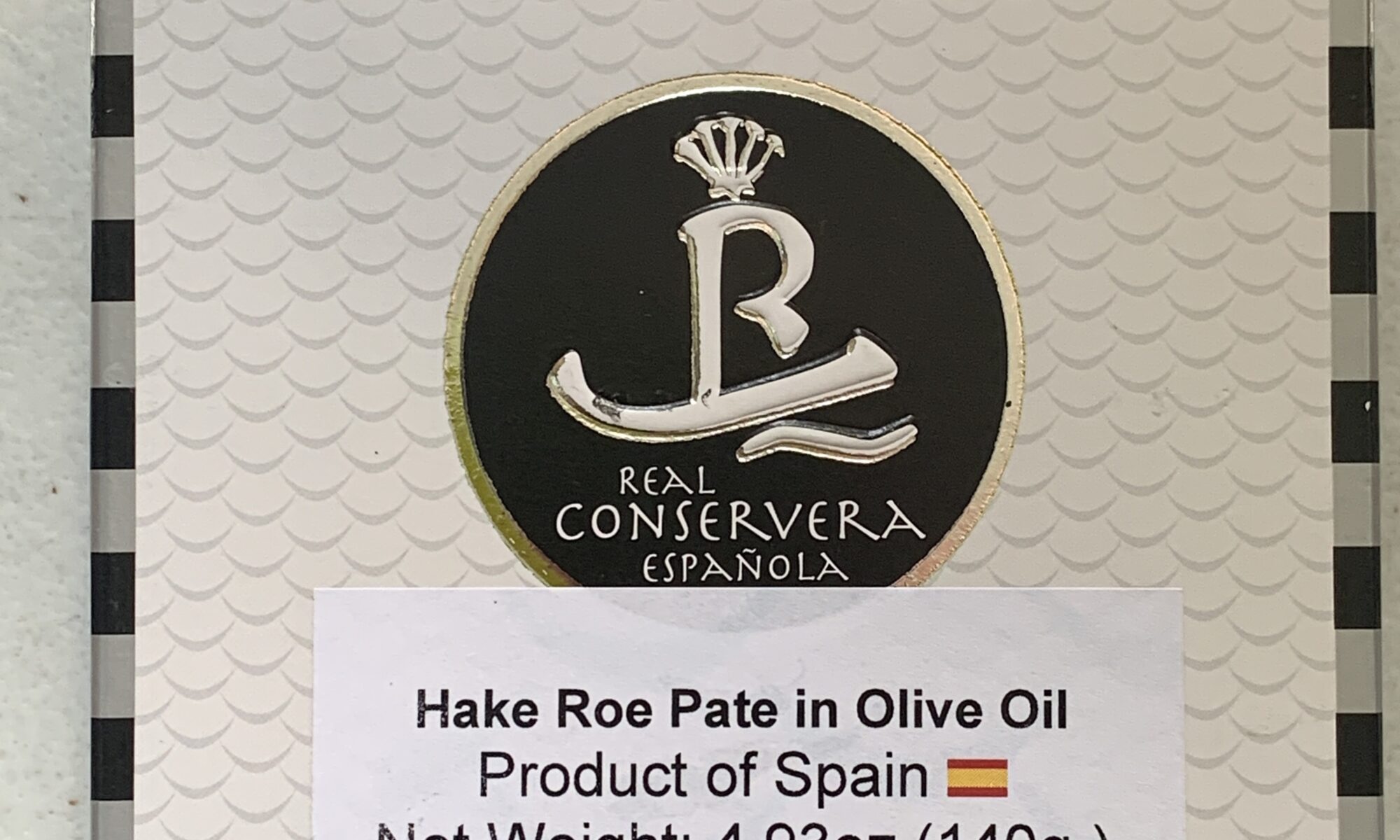 Image of the front of a package of Real Conservera Spicy Hake Roe Pâté