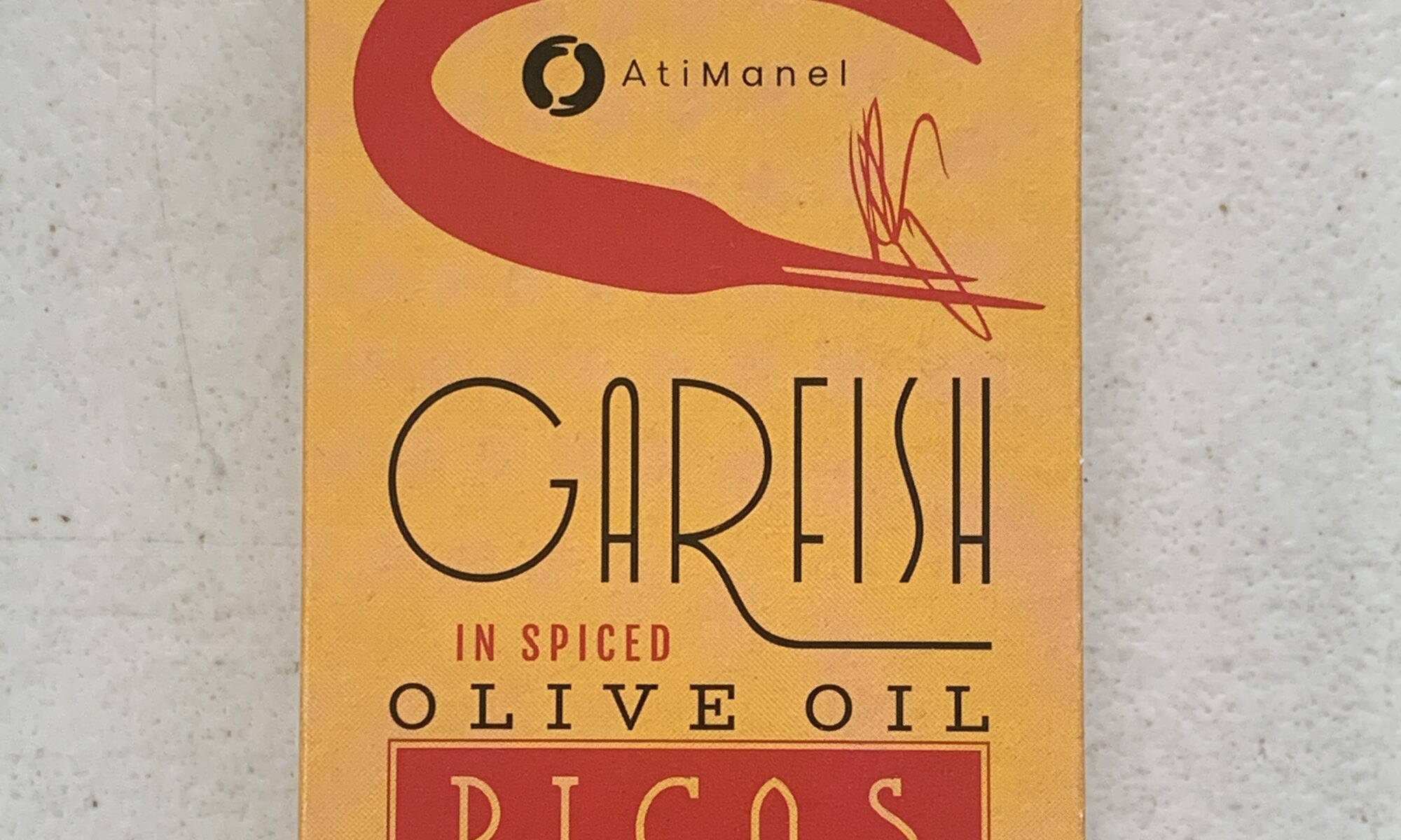 Image of the front of a package of Ati Manel Garfish in Spiced Olive Oil