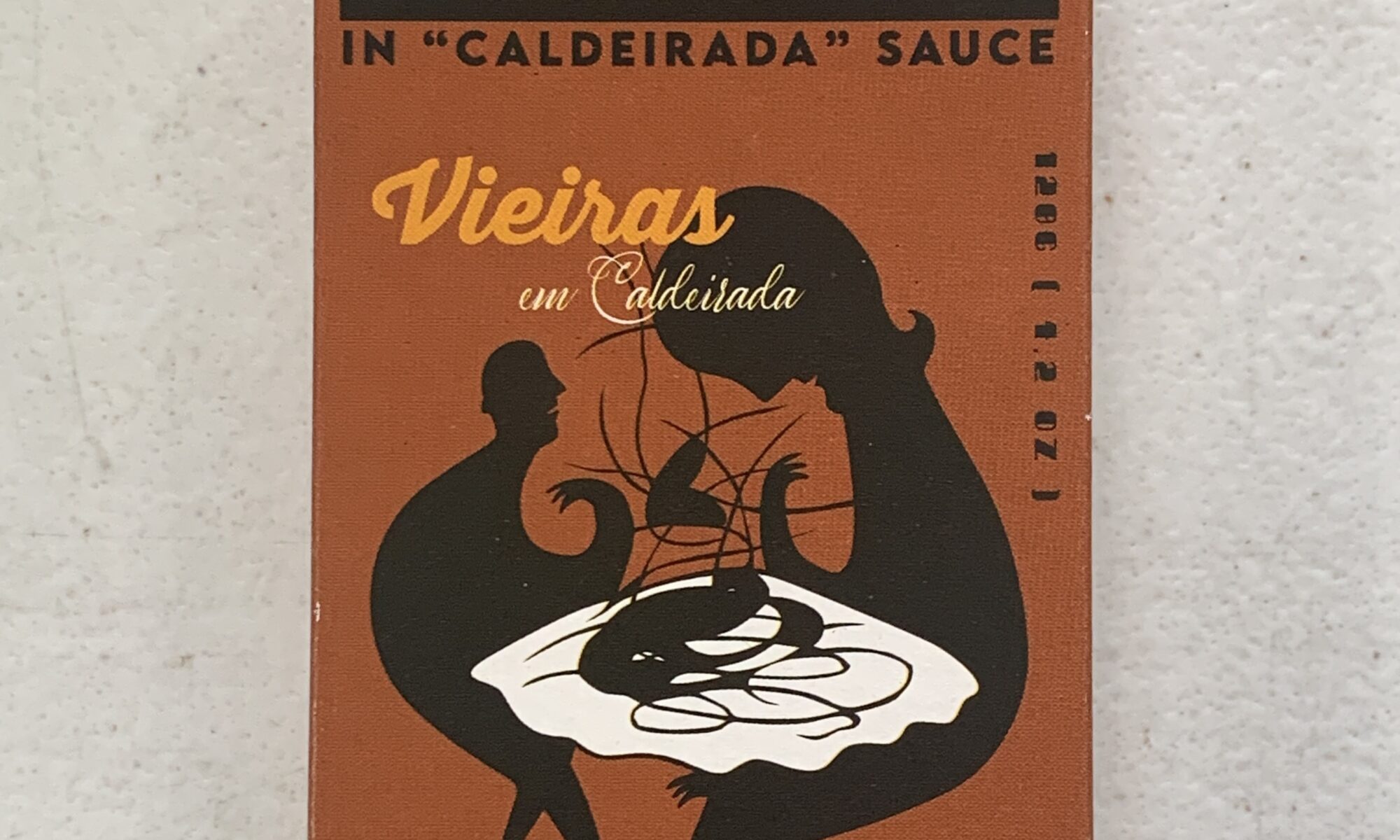 Image of the front of a package of Ati Manel Scallops in "Caldeirada" Sauce