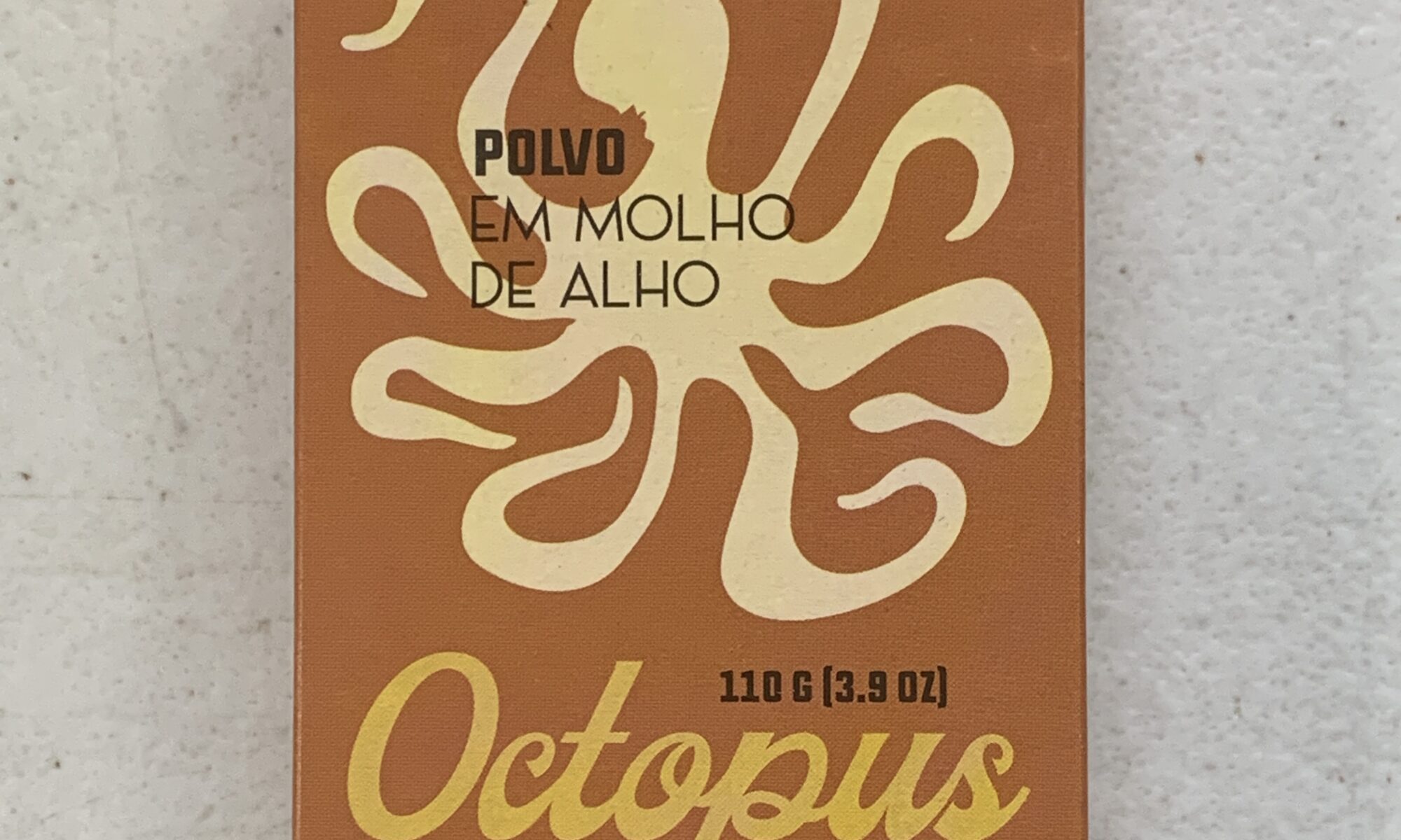 Image of the front of a package of Ati Manel Octopus in Garlic Sauce