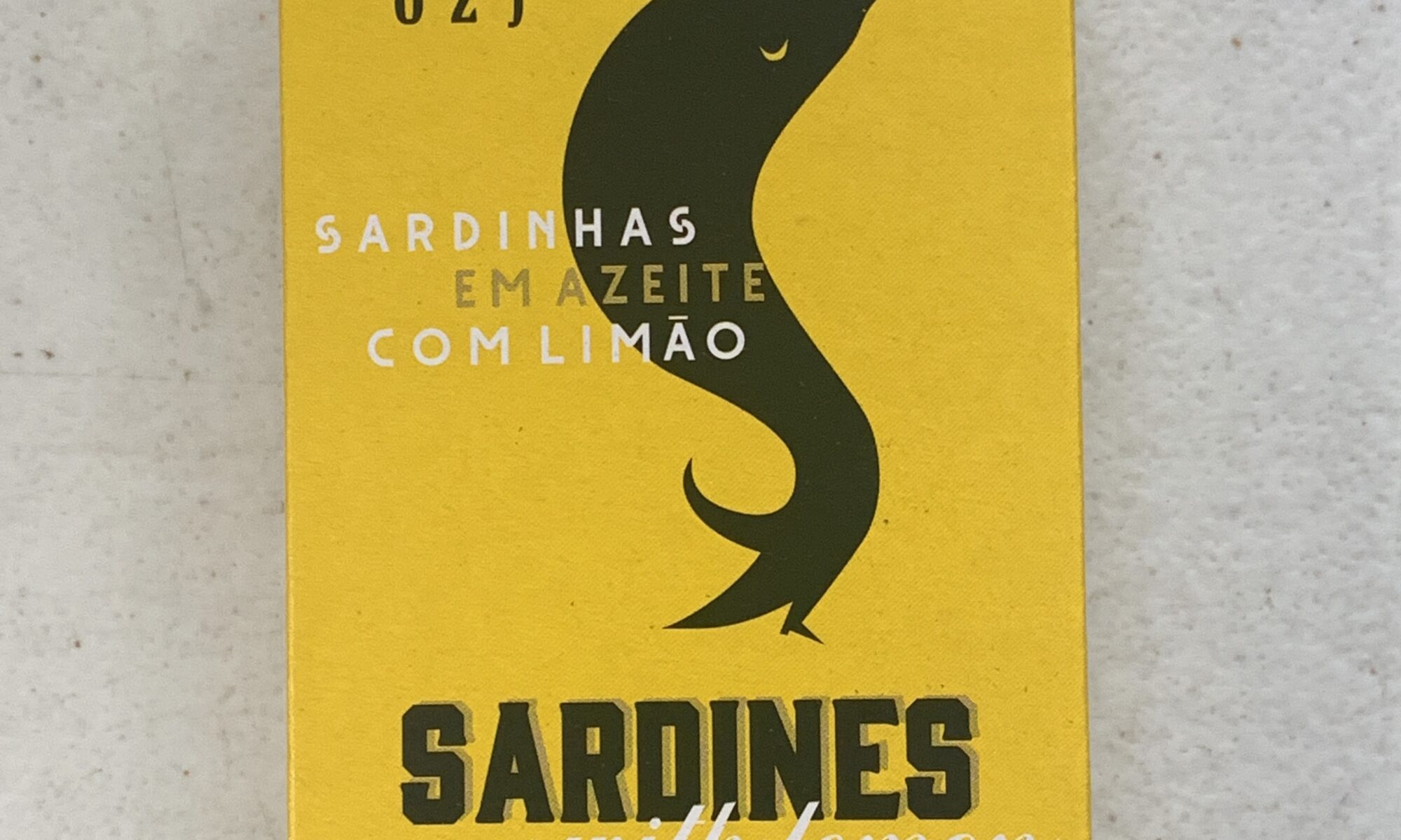 Image of the front of a package of Ati Manel Sardines in Olive Oil with Lemon