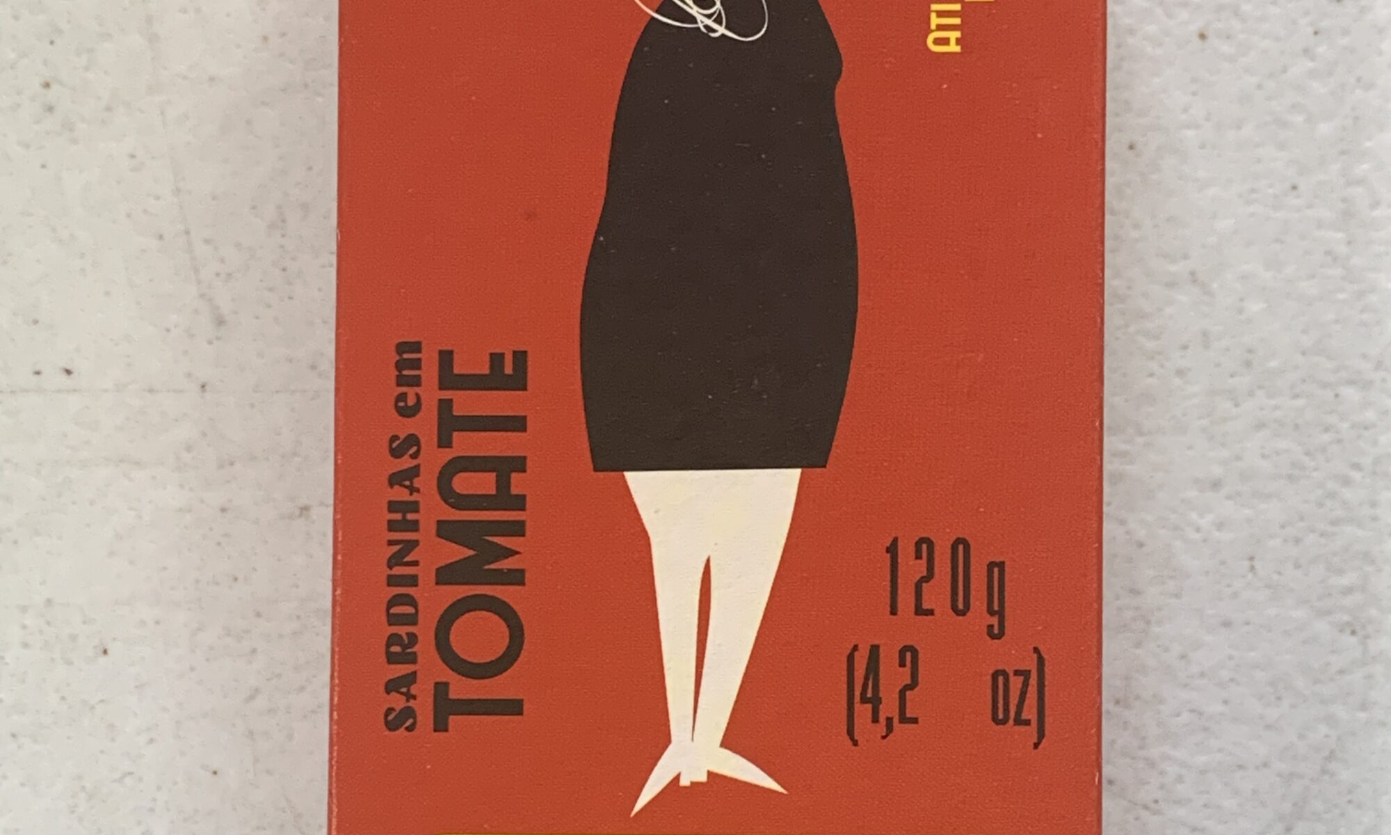 Image of the front of a package of Ati Manel Sardines in Tomato Sauce