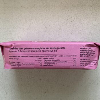 Image of the side panel of a package of Sardinha Skinless and Boneless Sardines in Spicy Olive Oil