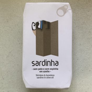 Image of the front of a package of Sardinha Skinless and Boneless Sardines in Olive Oil