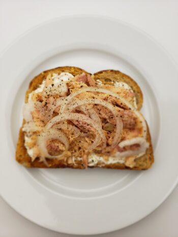 Image of Appel smoked trout on toast with cream cheese and onion