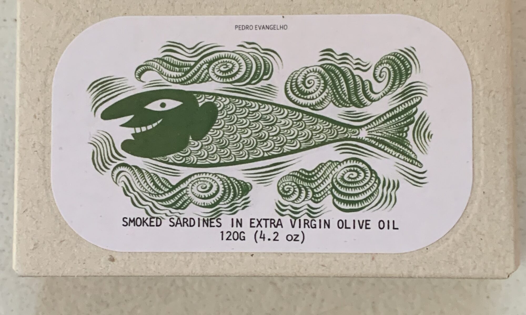 Image of the front of a package of José Gourmet Smoked Sardines in Extra Virgin Olive Oil
