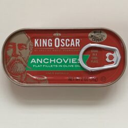 Image of the front of a can of King Oscar Anchovies, Flat Fillets in Olive Oil