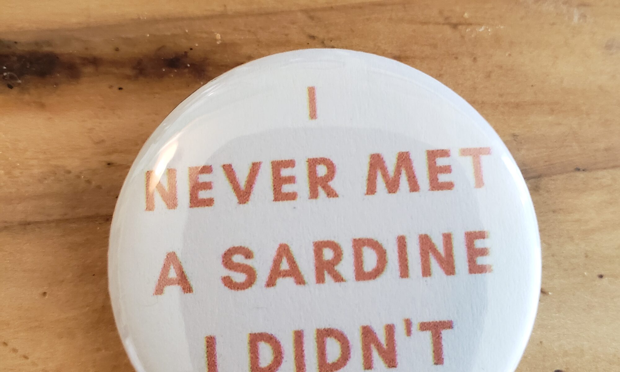 Image of "I never met a sardine I didn't eat" pinback button