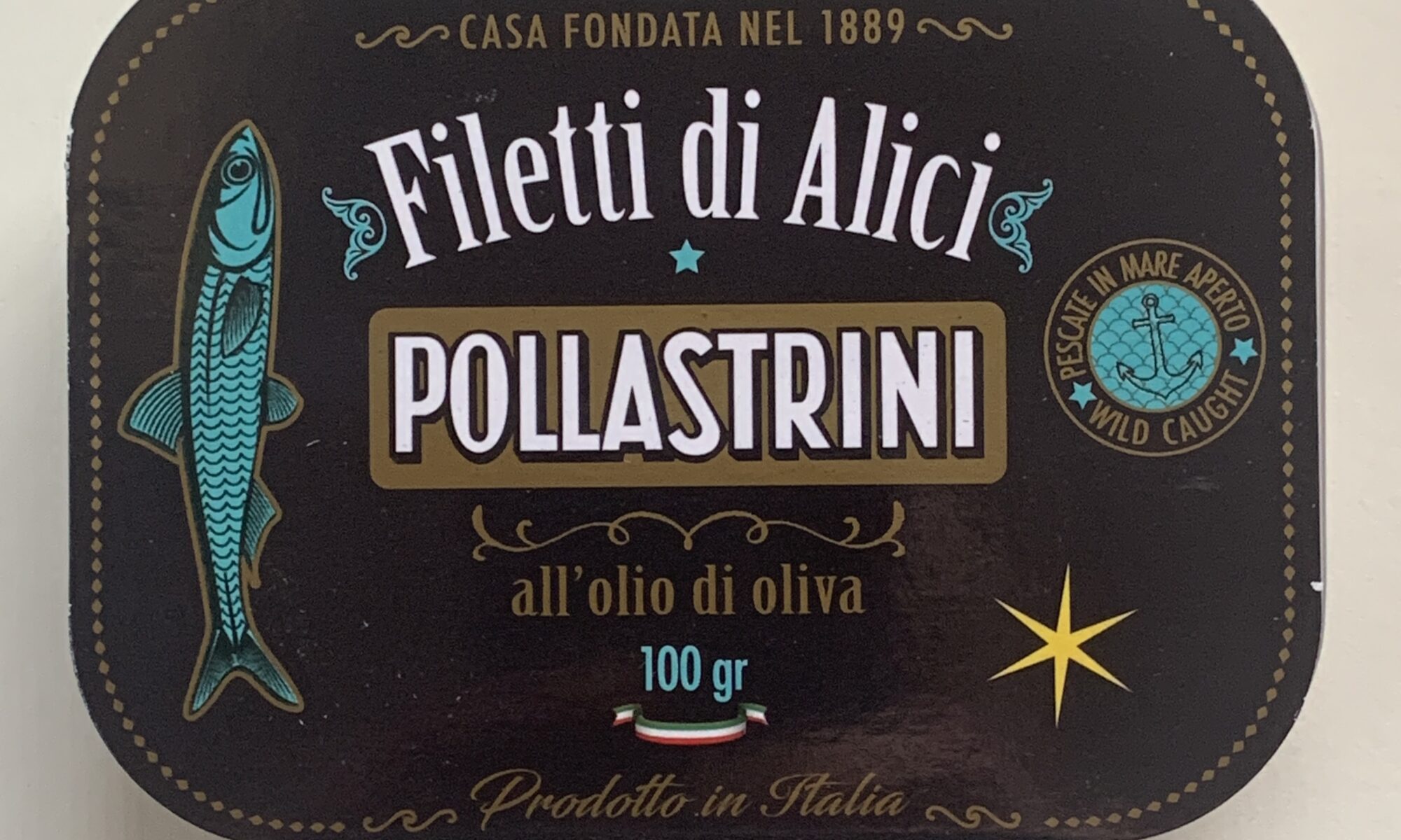 Image of the front of a tin of Pollastrini di Anzio Anchovy Fillets in Olive Oil