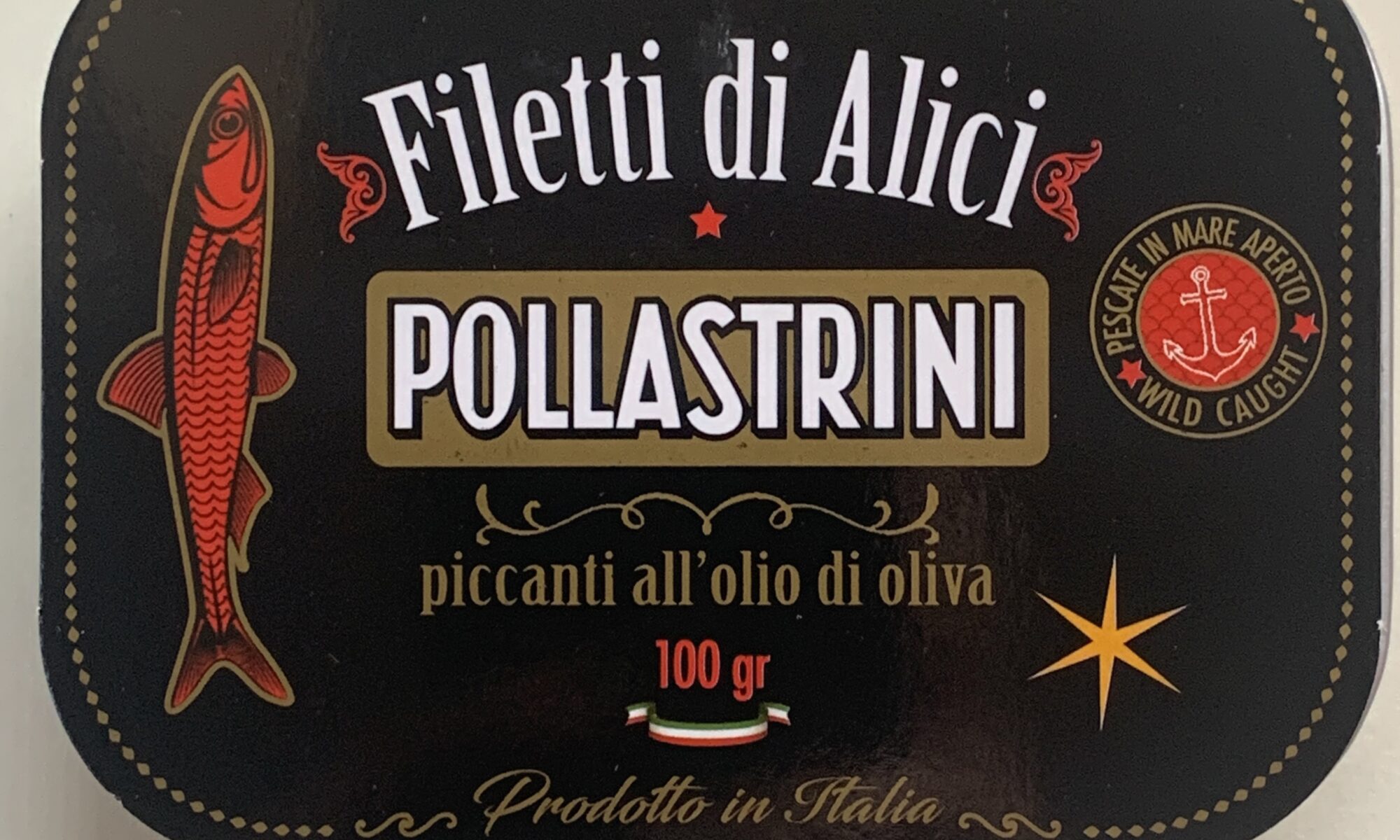 Image of the front of a tin of Pollastrini di Anzio Spicy Anchovy Fillets in Olive Oil